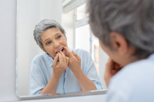 Personal care at home can help aging seniors maintain good oral health through daily care.